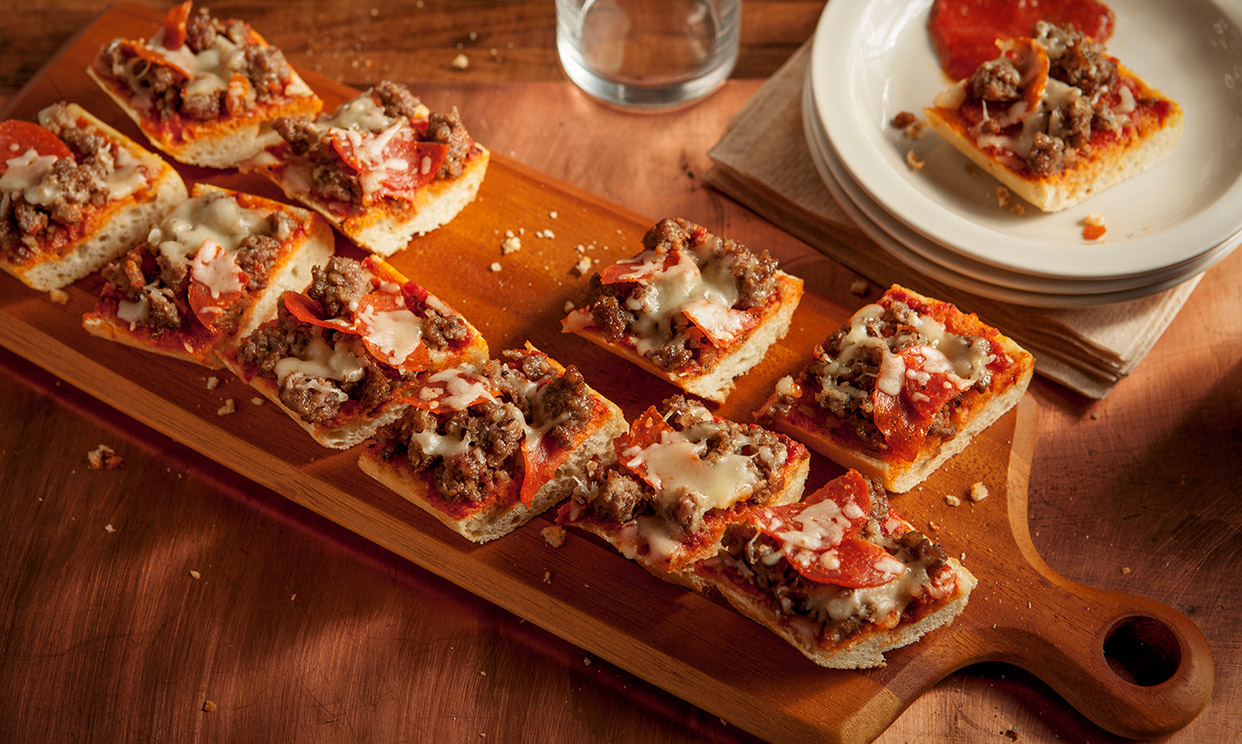 French bread pizza cut into squares
