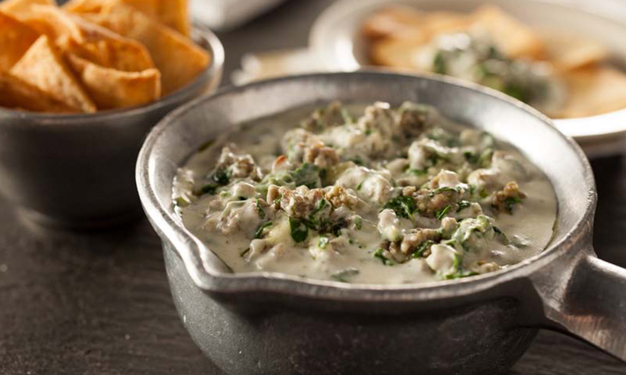 Sausage spinach dip in a bowl