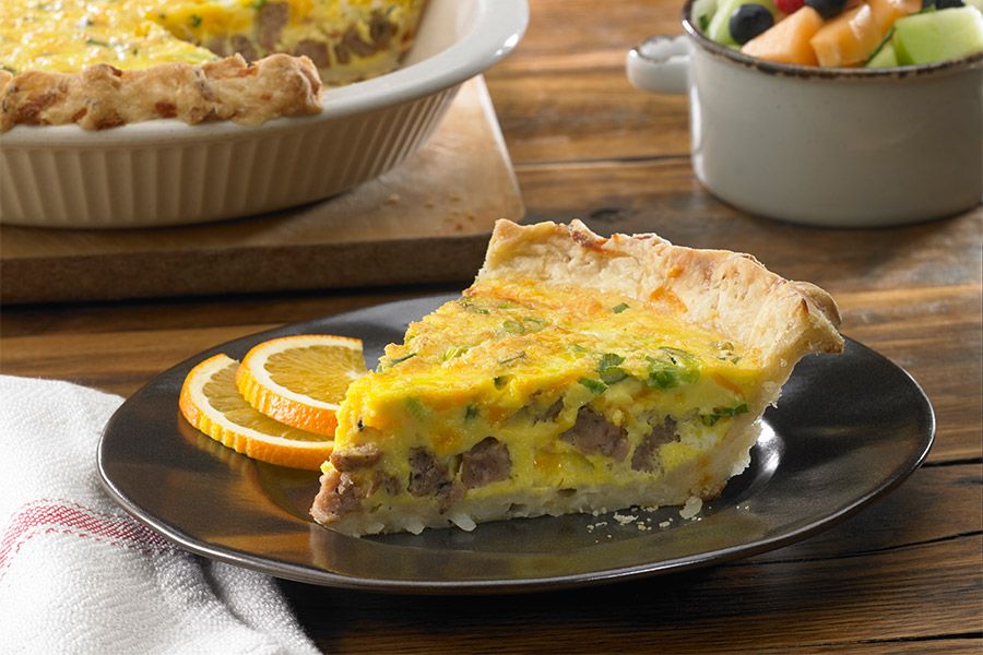 A slice of meat lovers quiche