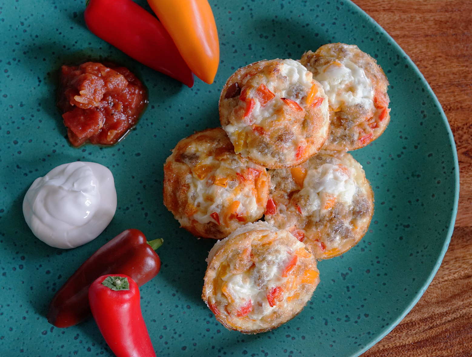 Easy and healthy Mexican breakfast cups with sour cream, salsa and peppers