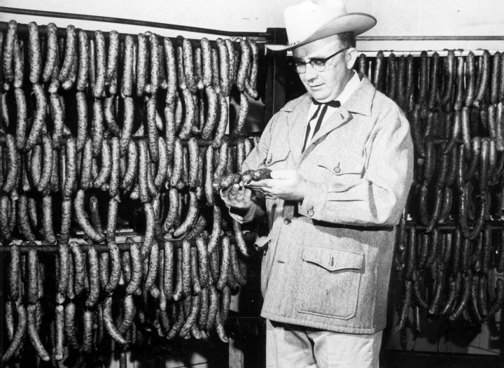 Bob Evans Farms History - Photo of man inspecting sausage