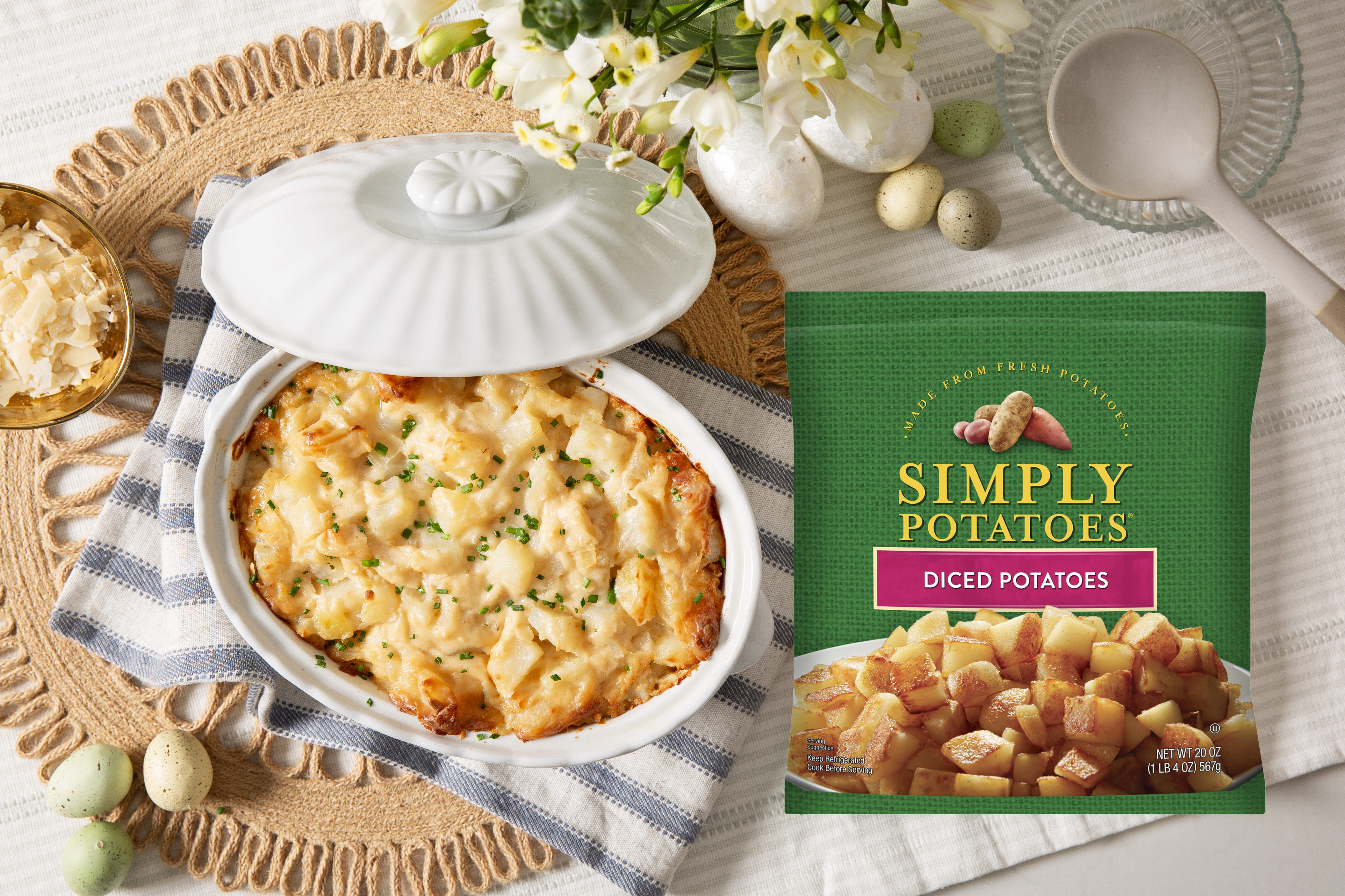 4-cheese potato casserole next to a package of Simply Potatoes Diced Potatoes