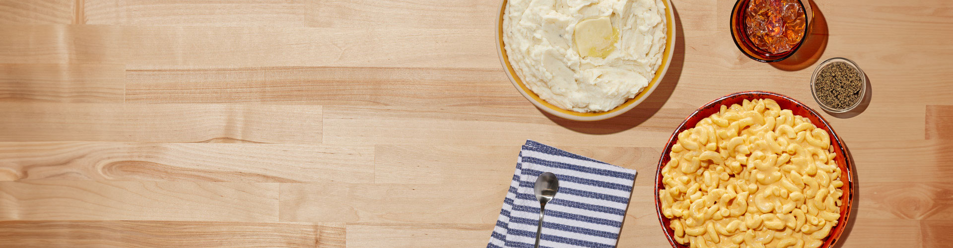 Photo of mashed potatoes and mac and cheese